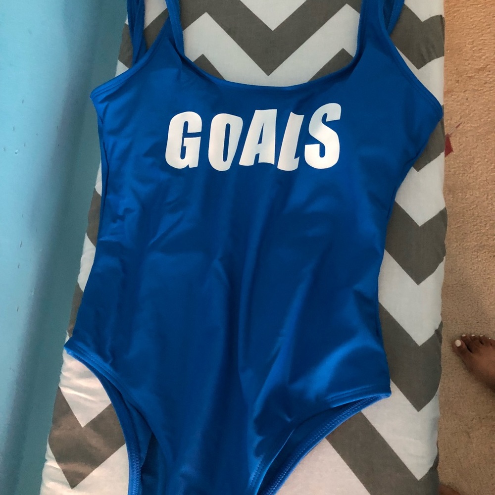 One piece blue bathing suit